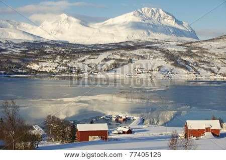 Winter view to Lavangen fjord and Soloy village, Troms county, Norway.