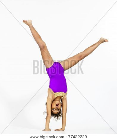 Young Cute Afro-american Girl Doing Gymnastics