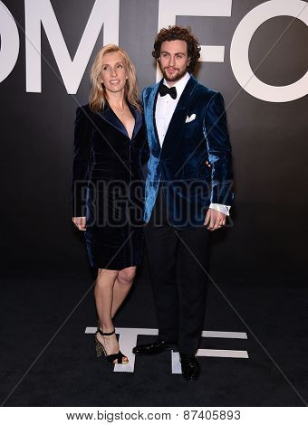 LOS ANGELES - FEB 20:  Aaron Taylor-Johnson & Sam Taylor-Johnson arrives to the Tom Ford Autumn/Winter 2015 Womenswear Collection Presentation  on February 20, 2015 in Hollywood, CA                