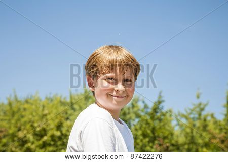 Happy Boy Is Smiling And Enjoying Life