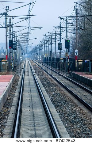 austria, upper austria, linz, wels. seen rails of a railway from a moving train between linz and wels from