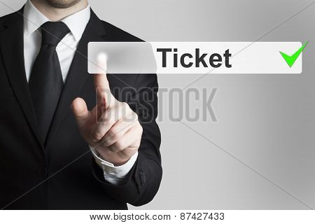 Businessman Pushing Button Ticket
