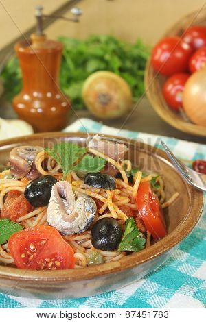 Spaghetti Alla Puttanesca With Anchovy And Tomatoes