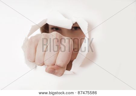 fist punching hole