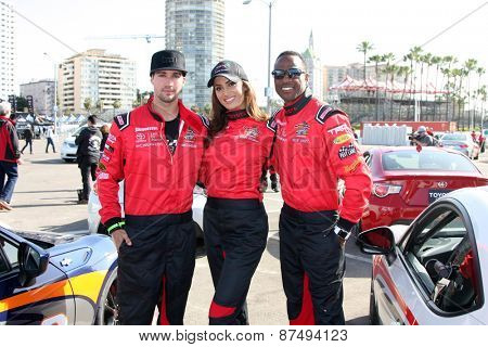 LOS ANGELES - FEB 7:  James Maslow, Donna Feldman, Willie Gault at the Toyota Grand Prix of Long Beach Pro/Celebrity Race Press Day at the Grand Prix Compound on FEB 7, 2015 in Long Beach, CA