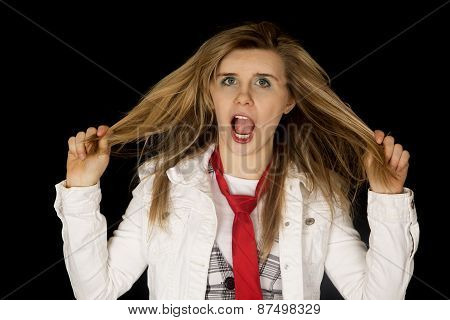Freaking Out Young Female Pulling Hair Black Background