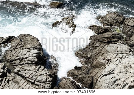 Sea rocks and waves