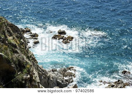 Sea rocks and waves