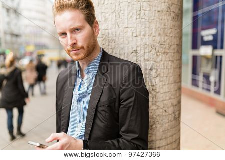 Businessman Portrait In A City