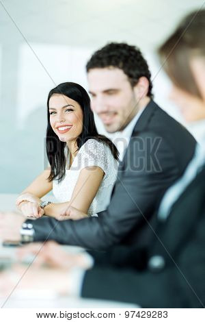 Business People Sitting At A Conference Table