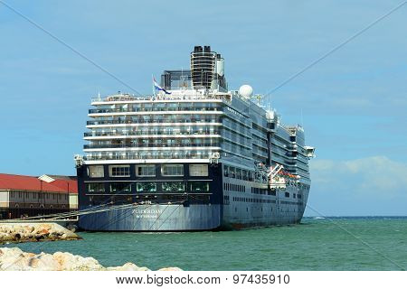 FALMOUTH, JAMAICA - DEC 29, 2014: Holland American Line Cruise ship Zuiderdam anchore offshore in Falmouth, Jamaica. Falmouth port is built by Royal Caribbean Cruise company in 2012.