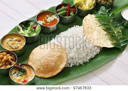 meals served on banana leaf, traditional south indian cuisine
