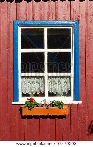 Nida. Traditional fisherman's house in Nida, Lithuania. Nida is a resort town in Lithuania. Located on the Curonian Spit between the Curonian Lagoon and the Baltic Sea. Unesco Heritage.