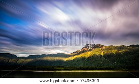 Dramatic Sky Over Mountain Range In British Columbia, Canada