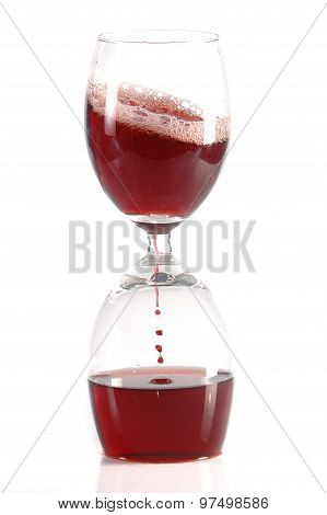 Hourglass From Glases Of Red Wine
