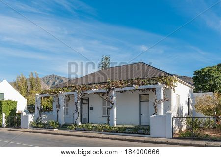 MONTAGU SOUTH AFRICA - MARCH 26 2017: An old house with grape vine verandah in Montagu a town in the Western Cape Province