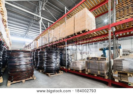 Large hangar warehouse industrial and logistics companies. Warehousing on the floor and called the high shelves.