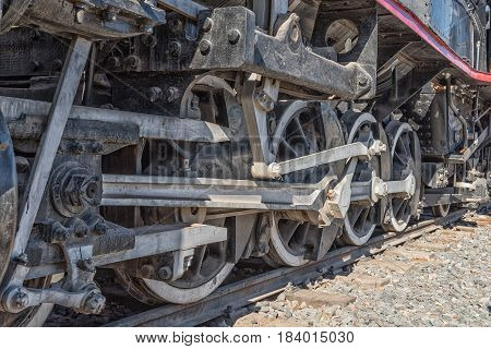 ASHTON SOUTH AFRICA - MARCH 26 2017: The wheels of a class CRB steam engine at Platform 62 a road stall in Ashton a town on the scenic Route 62 in the Western Cape Province