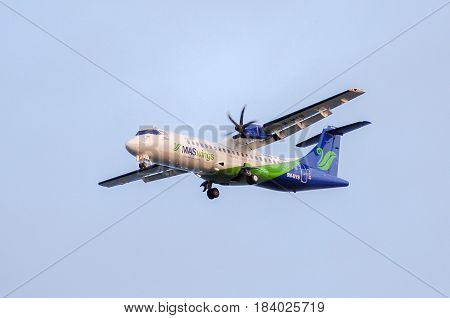 Labuan,Malaysia-Nov 24,2014:MASwings Airlines ATR-72-500 takes off from Labuan Airport on Nov 24 2014.MASwings is the regional community airline for East Malaysia states of Sabah and Sarawak, also fondly known as Borneo.