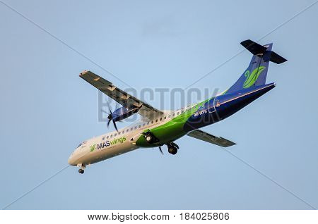 Labuan,Malaysia-Nov 24,2014:MASwings Airlines ATR-72-500 takes off from Labuan Airport on Nov 24 2014.MASwings is the regional community airline for East Malaysia states of Sabah and Sarawak, also fondly known as Borneo.
