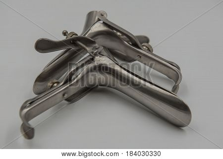 speculum on white background. Medical concept .