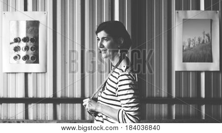 Woman traveling sightseeing at gallery exhibition