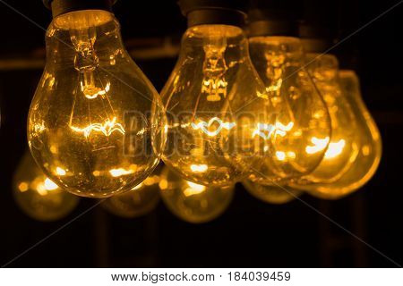 old vintage light bulbs in the night selective focus. shallow DOF.