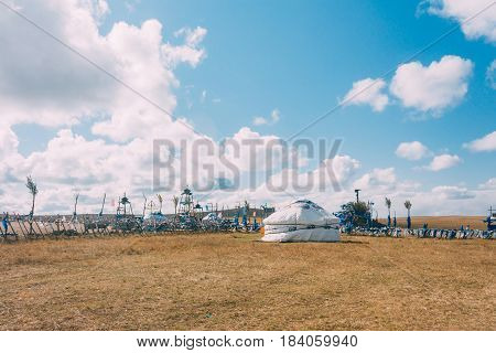 A Yurt In Mongolia Grassland With Blue Sky,horizontal
