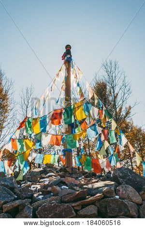 Colourful Obo And Aobao Landscape In Mongolia ,mongol Totem, In Forest With Blue Sky,veritcal