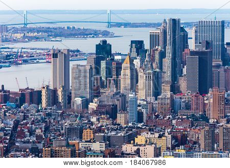 New York - April of 2015, USA: Aerial view of Manhattan skyscrapers downtown and Verrazano Narrows bridge