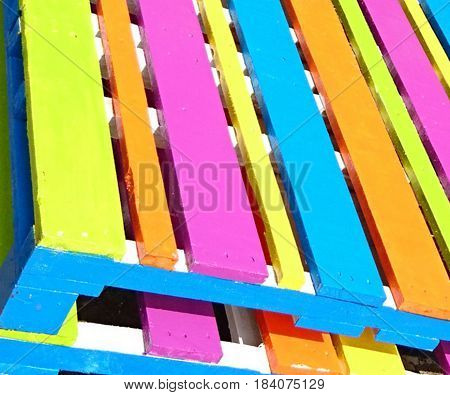 reclaimed pallet filled with bright awesome colors
