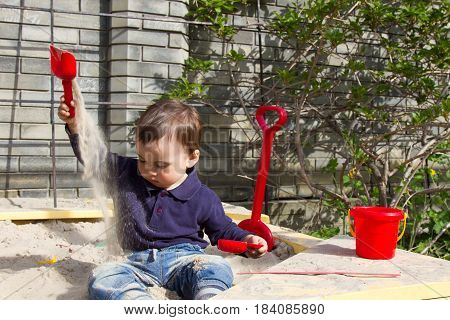 Active Little Boy On Playground. Playing Child In Sandbox