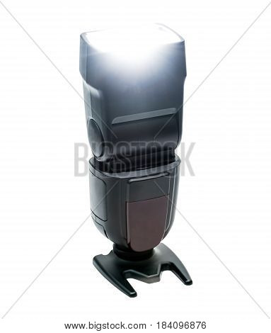 External flash speedlight firing isolated on white background
