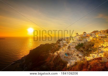 famouse sunset of Oia over Aegan sea, Santorini islandr, retro toned