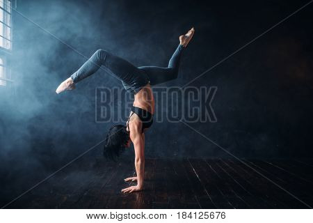 Contemp dance gymnastic exercise in studio