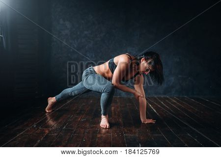 Contemp dancing female performer in dance class