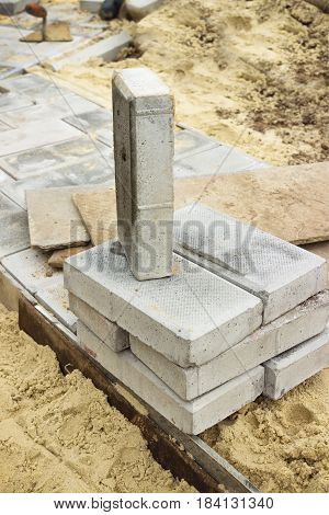 Path of concrete cobblestone in the process of construction