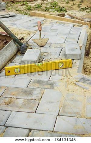 Path of concrete cobbles in the process of construction