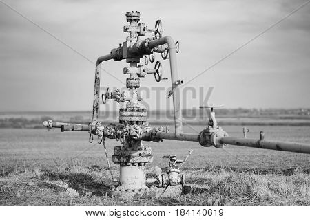 Gas Pipeline Middle Of The Field. Extraction Of Gas From Storage, Grayscale Effect