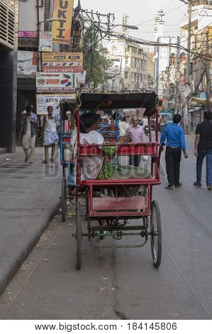 DELHI INDIA - JUN 7 : rickshaw in front of chawri bazar metro station in old Delhi of Delhi on june 7 2015 india. rickshaw is three wheeler taxi for local area of Delhi