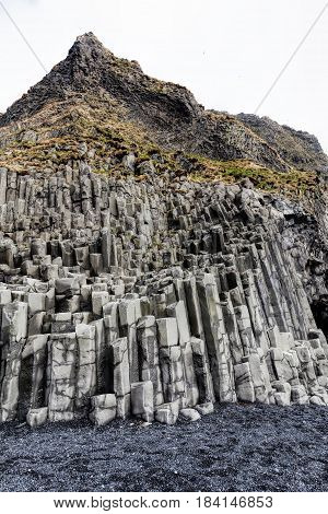 Rock Formations On The Reynisfjall Mountain In Iceland.
