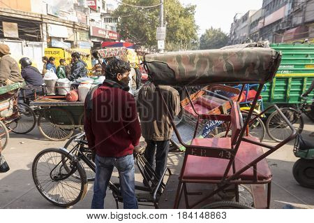 DELHI INDIA - DEC 20 : rickshaw in crowded and jam traffic at chandni chowk in old Delhi of Delhi on december 20 2014 india.