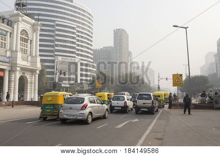 DELHI INDIA-DEC 25 : traffic in connaught place circle . this place is large shopping place in central delhi on december 25 2014 india