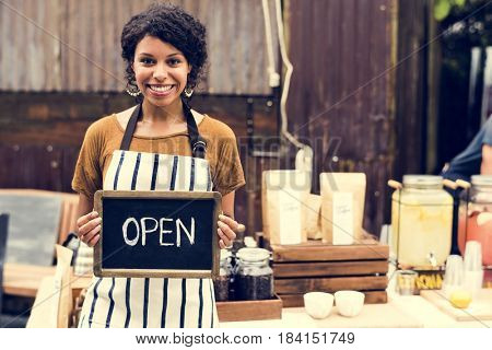 Adult Women with Beverage at Food Stall Market with Open Sign