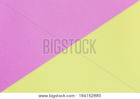 yellow and pink pastel background with copy space. Texture of fashion minimal concept. Top view. Flat lay.
