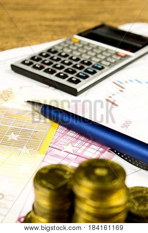 calculatorpencil and money on graffica the Dow Jones on forex market