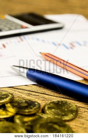 calculatorpencil and money on graffica the Dow Jones on forex market