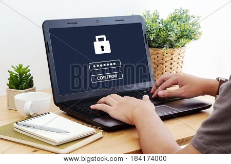 Man typing password on labtop screen background cyber security concept