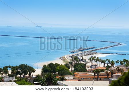 Beautiful view of Long Beach coastline with pier and levee, United States
