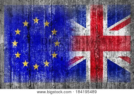 EU and United Kingdom flag on concrete wall